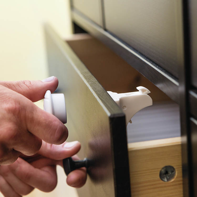 Magnetic child lock for cupboards and drawers