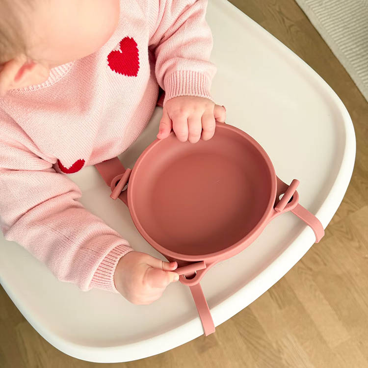 Children's bowl with suction cup and strap