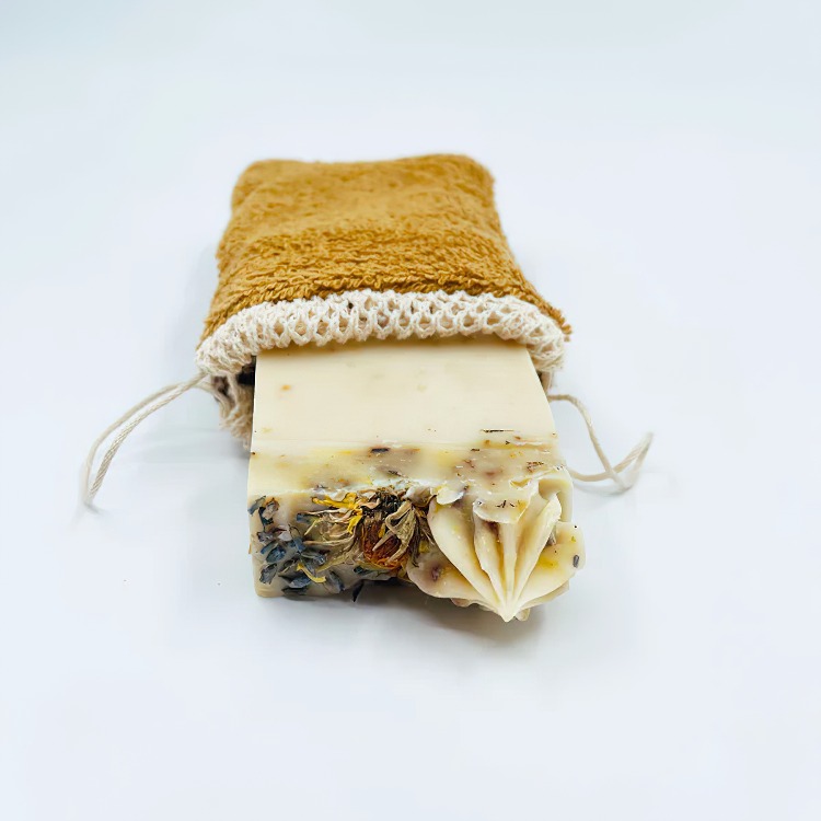 Soap pouch with exfoliating surface
