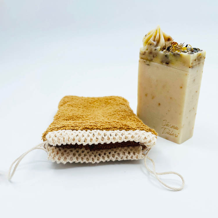 Soap pouch with exfoliating surface